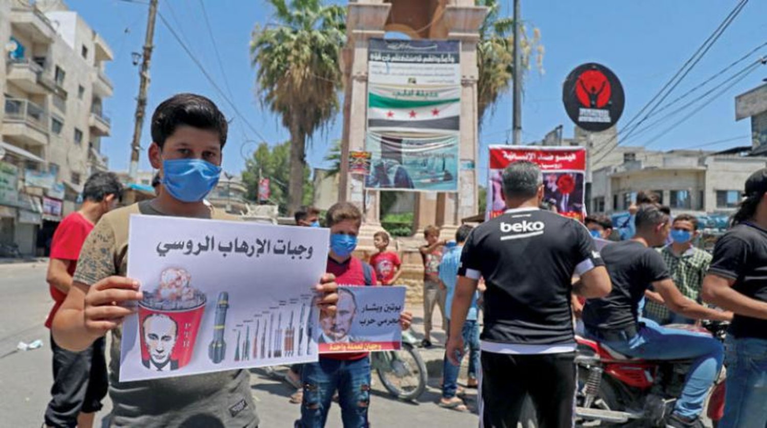 Rusya ve Çin’in insani yardımları veto etmesi üzerine İdlib’de gösteri düzenlendi (AFP)