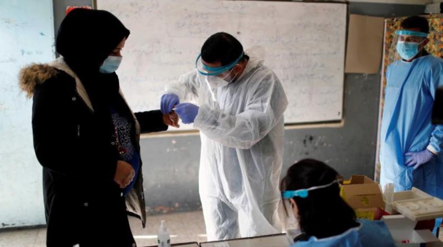 Bağdat'taki bir koronavirüs test merkezi (Reuters)