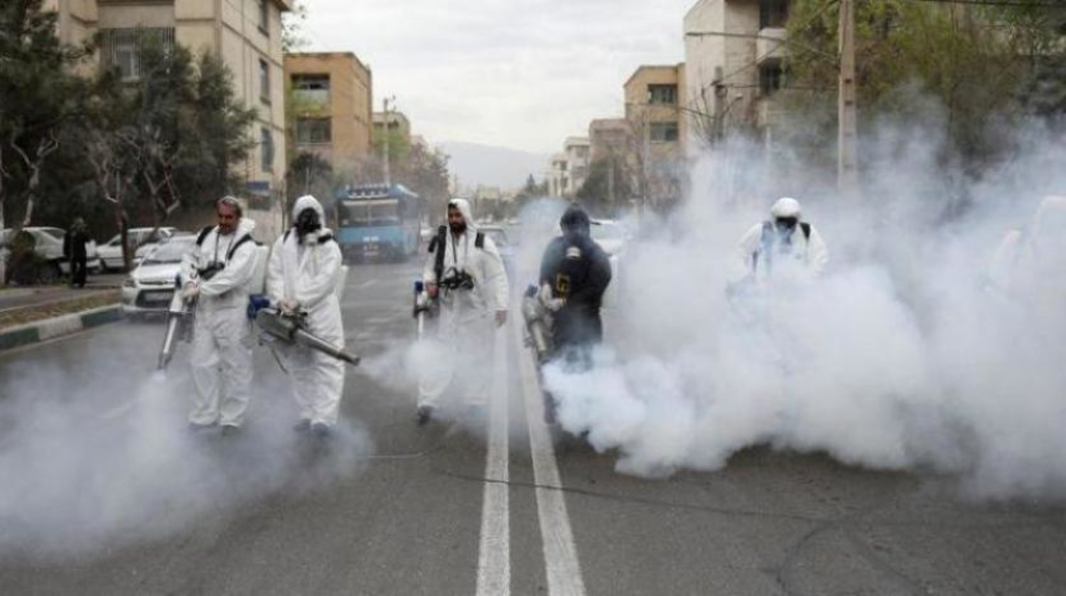 İran'ın başkenti Tahran'da koronavirüsle mücadele kapsamında yürütülen çalışmaların bir kısmı  (Arşiv - Reuters)
