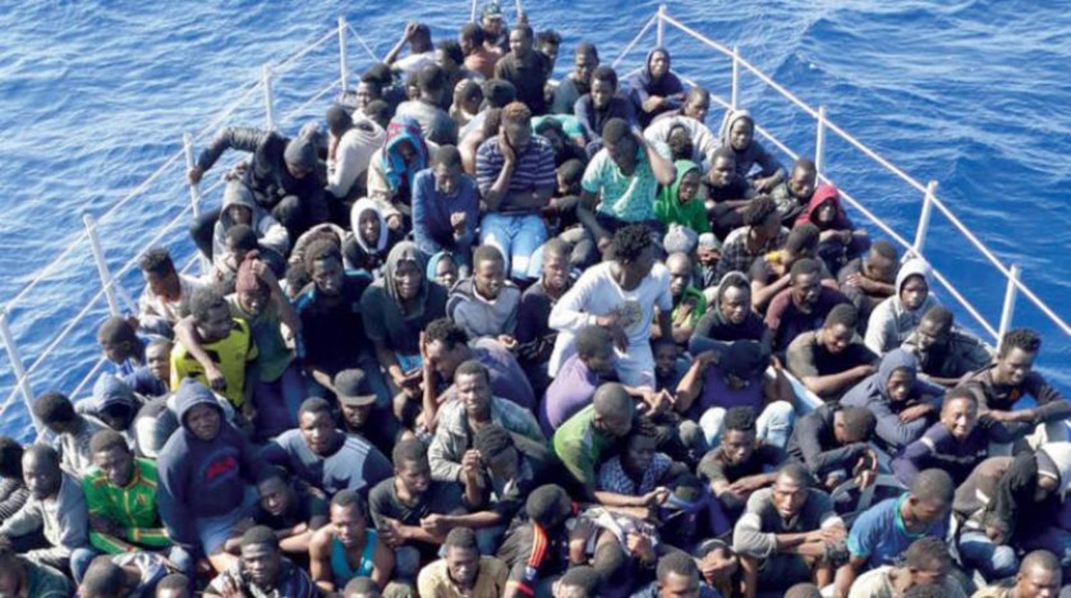 Libya Sahil Güvenlik tarafından kurtarılan göçmenler (AP) 