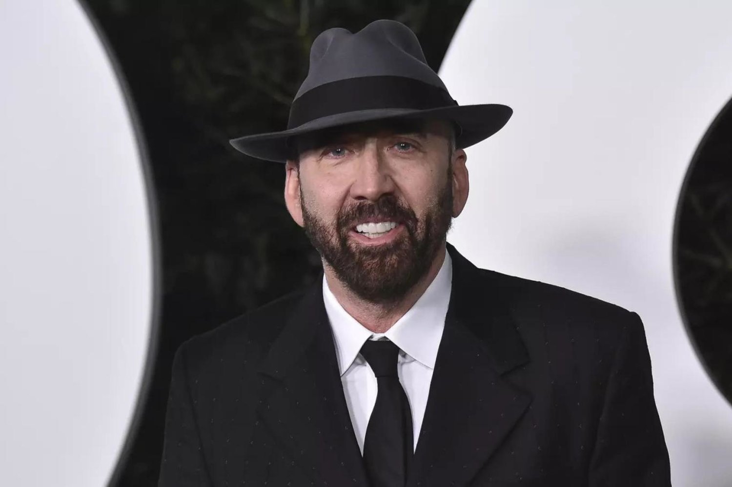 Nicolas Cage, 18 Kasım 2021'de düzenlenen GQ Yılın Erkekleri Partisi'ne katılmıştı (AP)