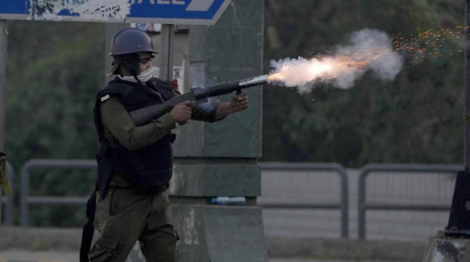 Pakistan polisi ile İmran Han yandaşları arasında çıkan çatışmalardan (AP) 
