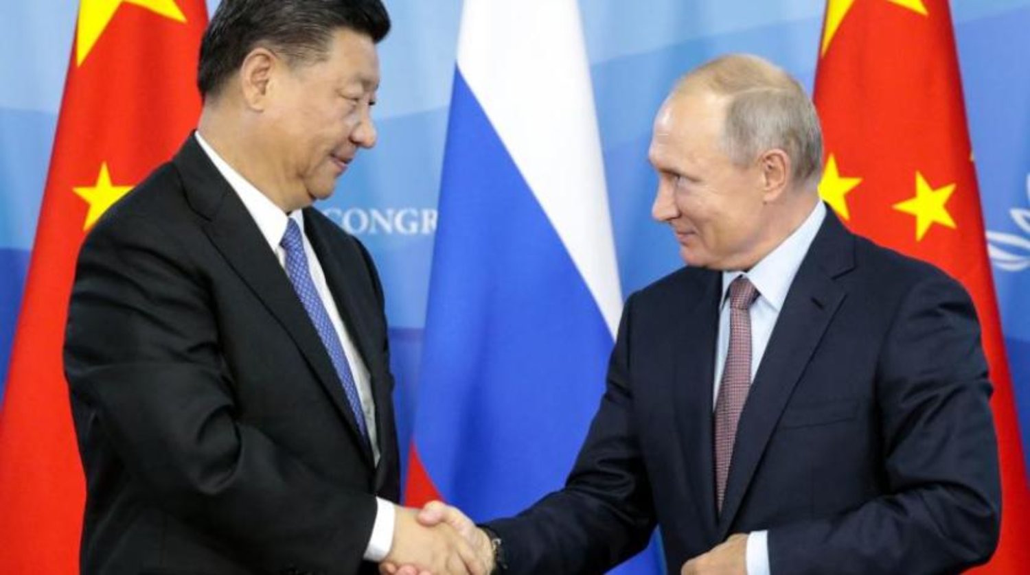 Rusya ve Çin devlet başkanları, 2018'de Moskova'da bir önceki zirvede (AFP)